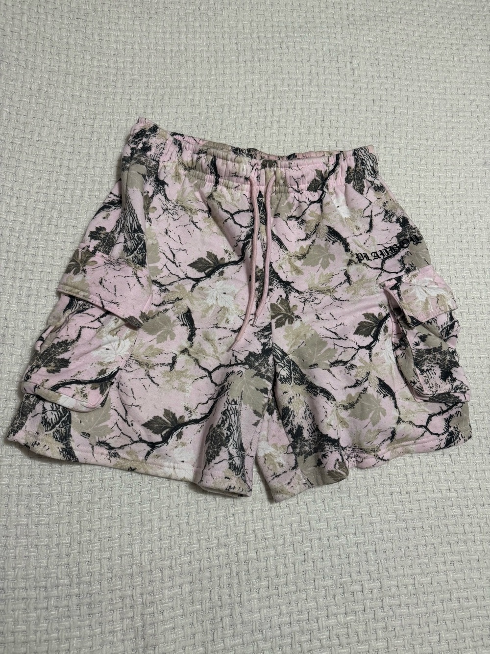 Playboy women’s pink camo cargo sweat shorts.  Large.  Excellent condition